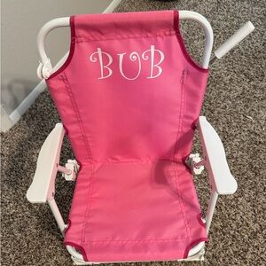 Pink and white baby beach chair and umbrella